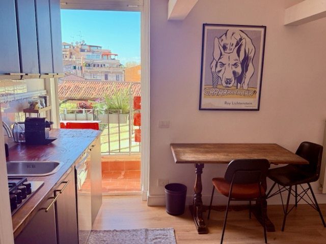 Dining table by the balcony door