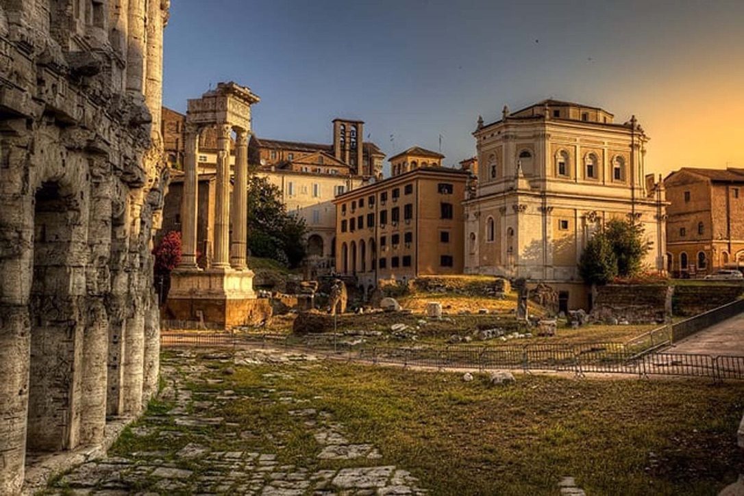 The Theatre of Marcellus and the ancient columns at sunset